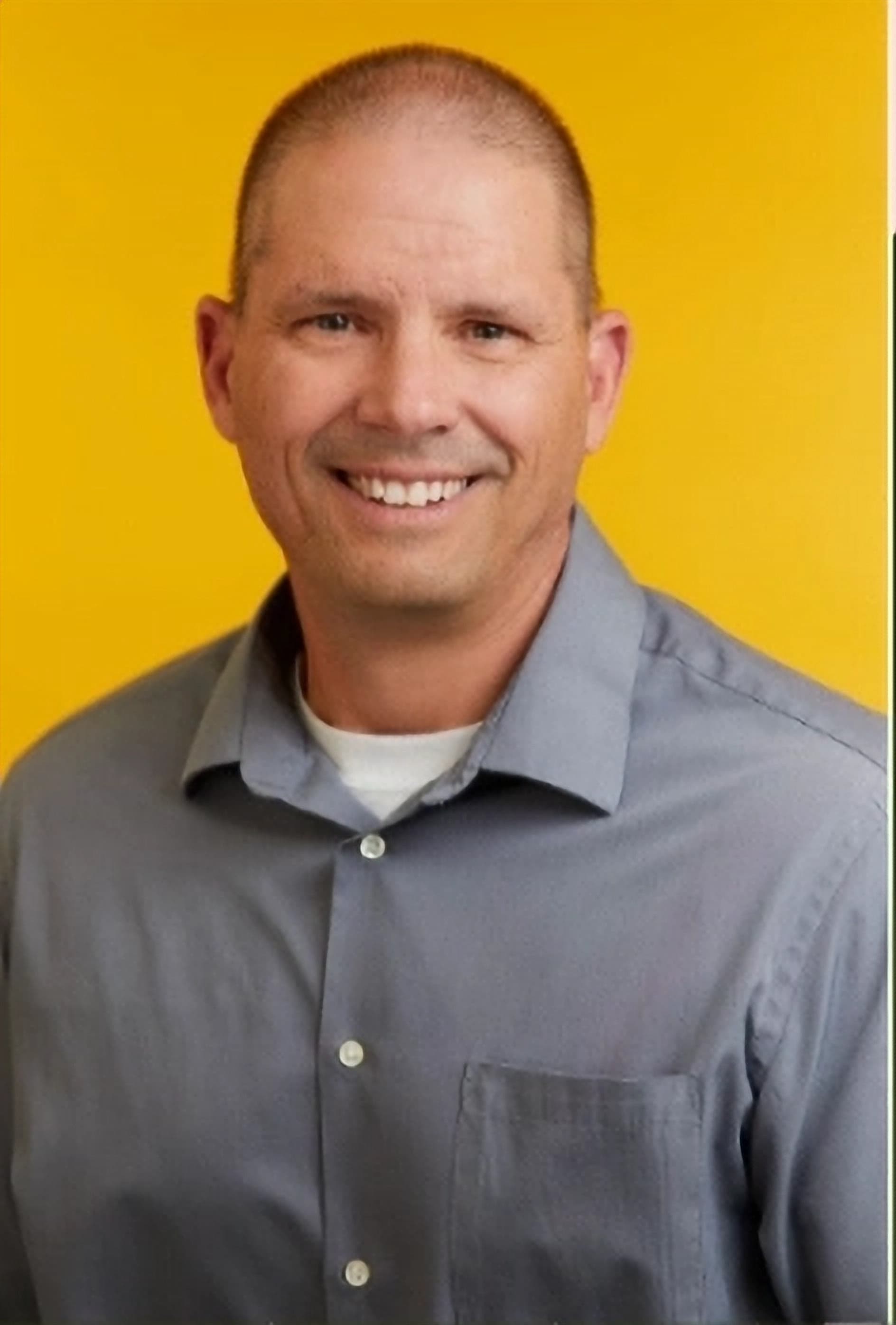 Mike Jud, Senior Director of Customer Success at Vroozi